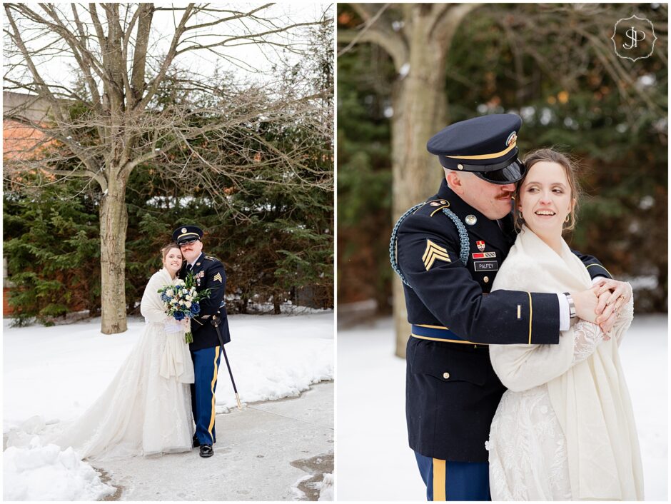Military couple snuggling up for wedding photos on their wedding day in the snow and cold 