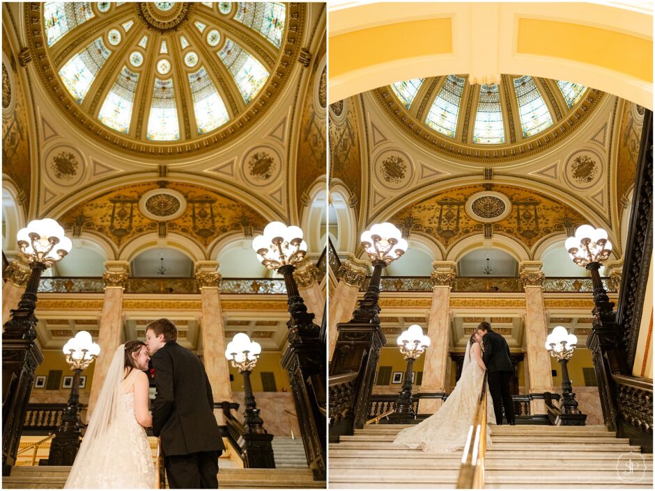 Couple posing on the stairs in the Washington County Courthouse PA for wedding photos 