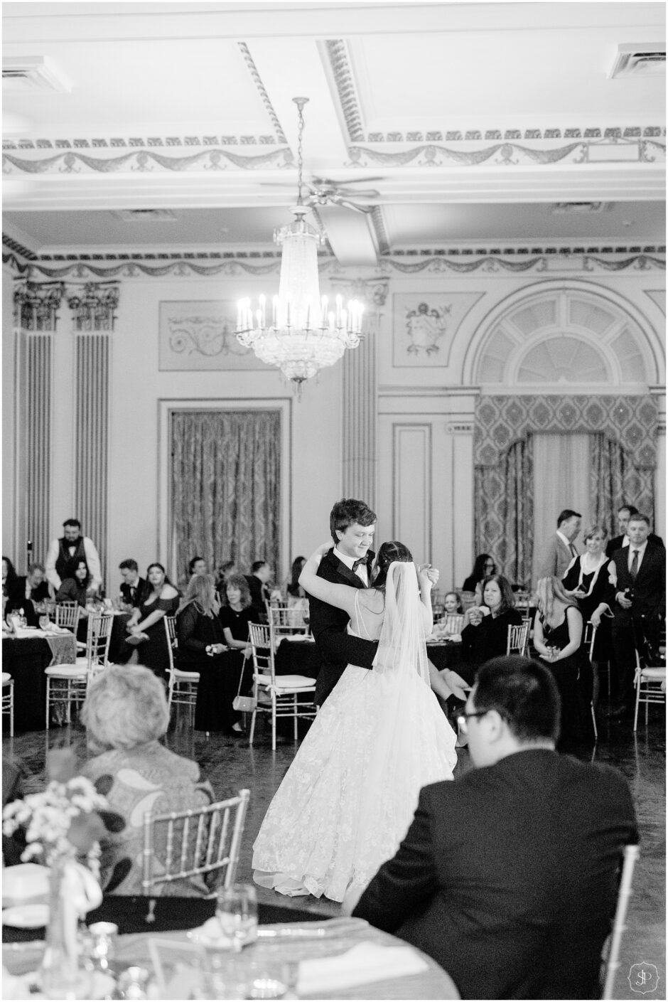 black and white photo of the bride and groom dancing their first dance at the George Washington Hotel