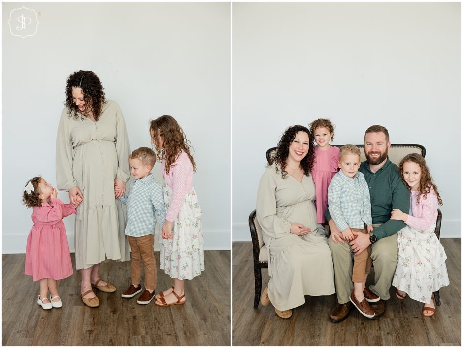 Latrobe studio family portait session as a family of five almost six sitting on a couch in the studio. 