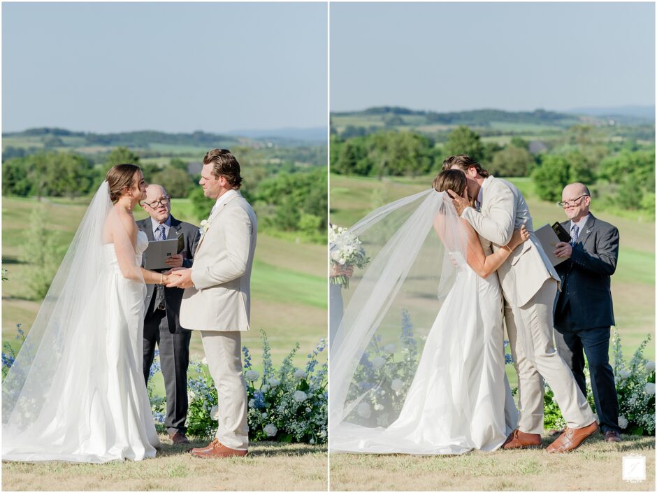 bride and groom share a first kiss on their wedding day  with their marriage license. 